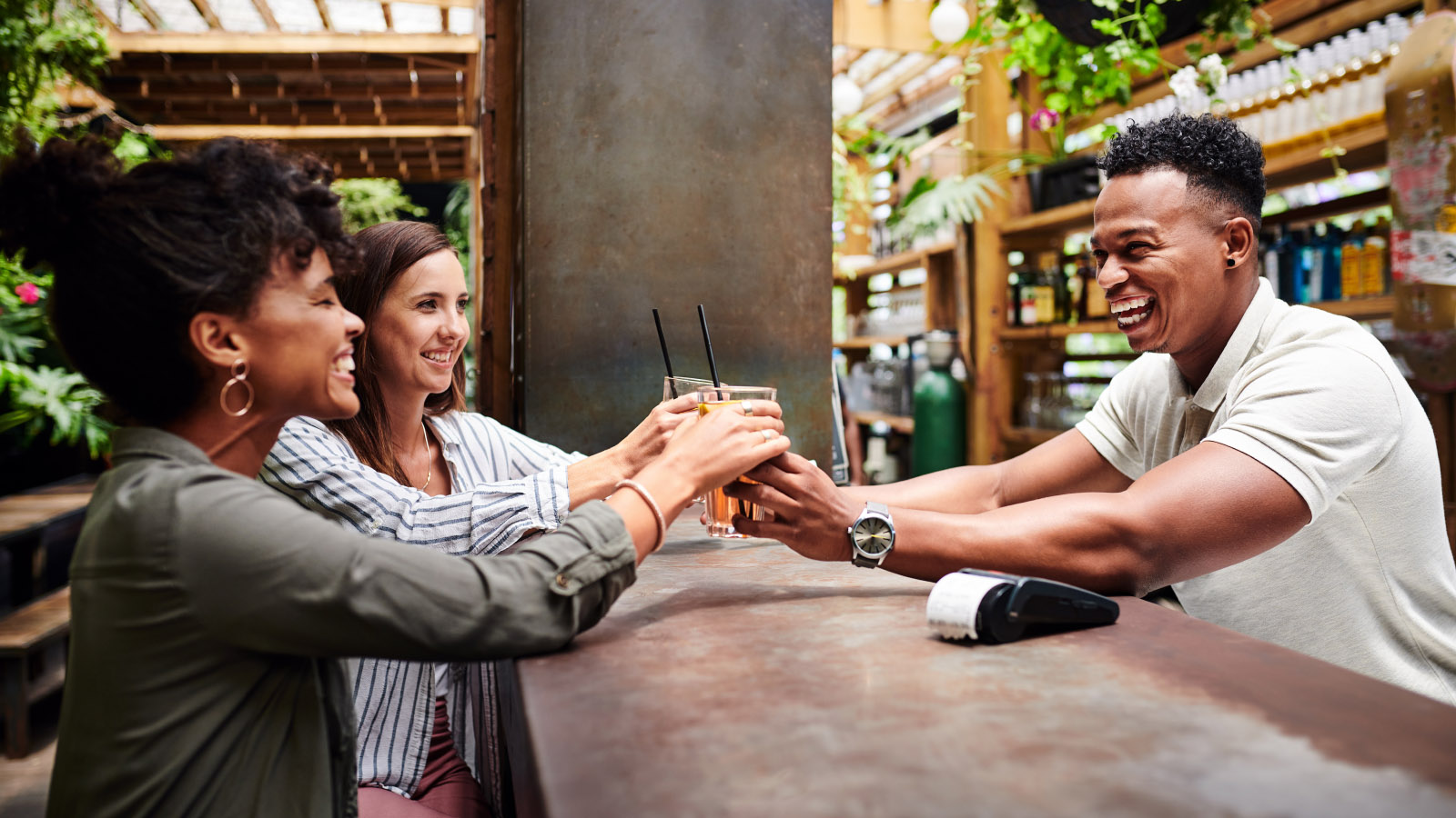 After learning how to get a summer job and choosing from different summer job ideas, a man works as a bartender.