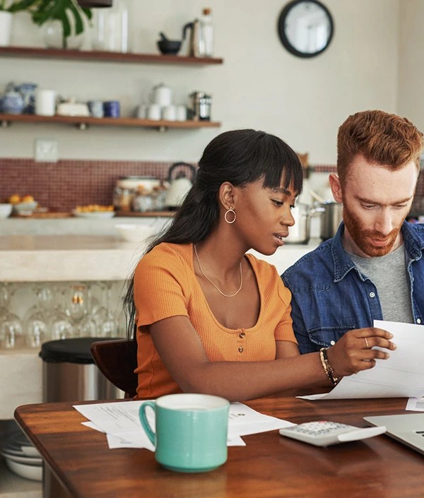 A couple plans their retirement savings together.