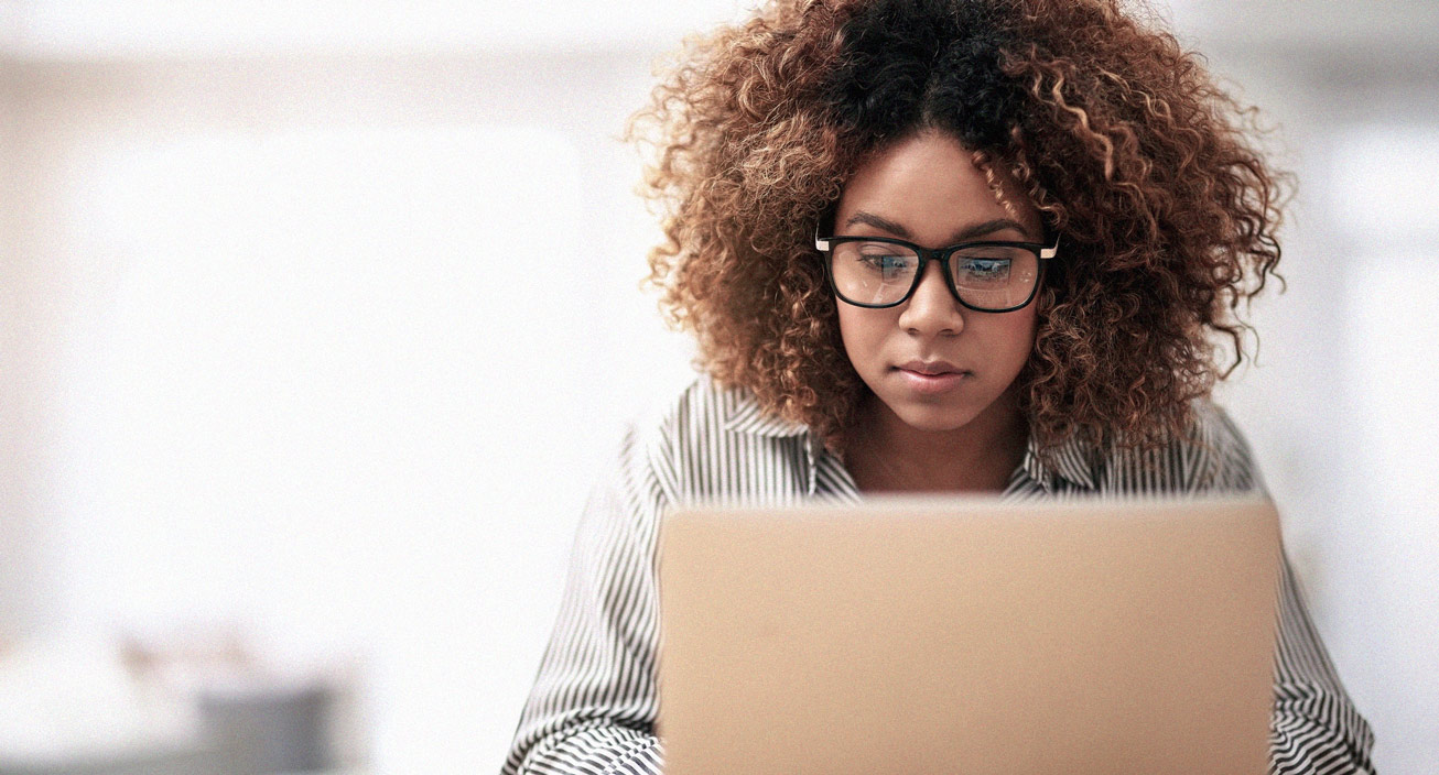 woman working on laptop in home