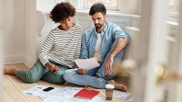 couple reviewing spending budget together