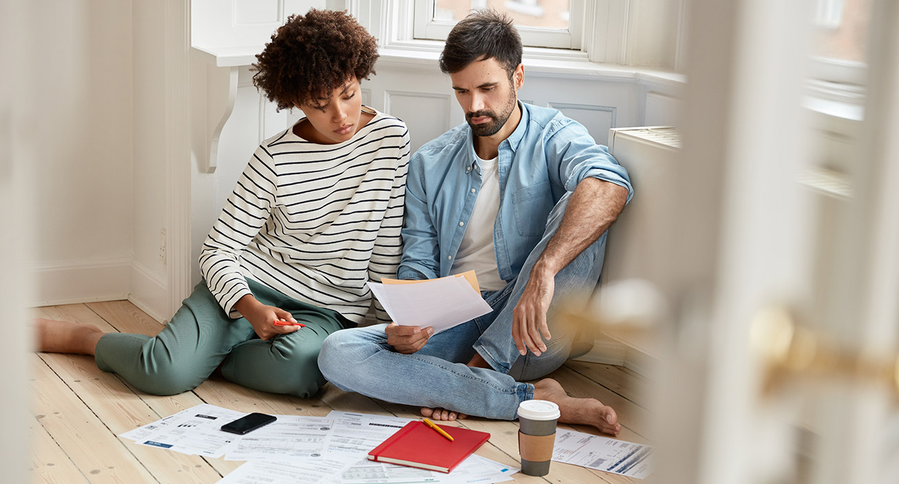 couple reviewing spending budget together