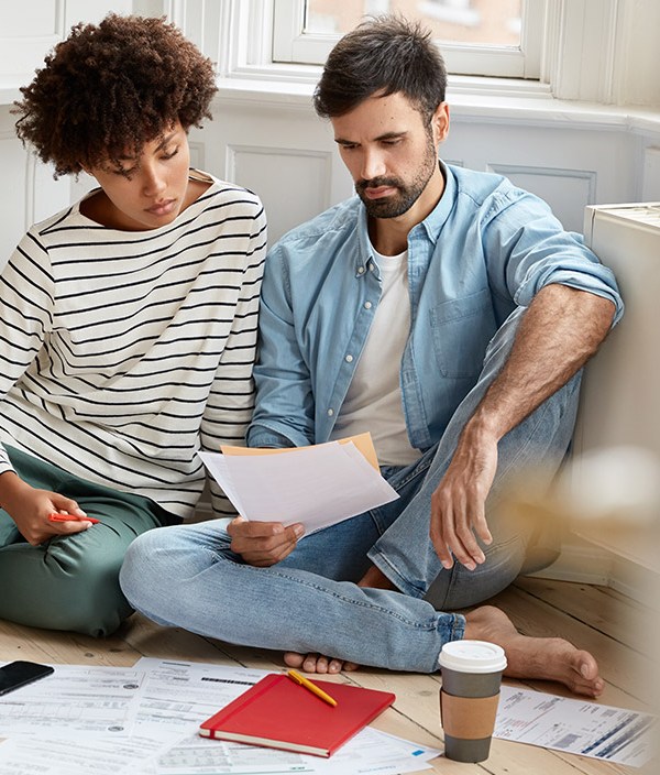 couple reviewing spending budget together