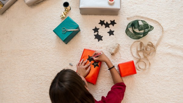 Girl Making Christmas Presents.