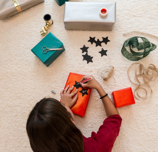 Girl Making Christmas Presents.