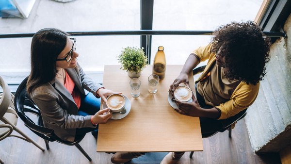 two-ladies-talking-over-coffee