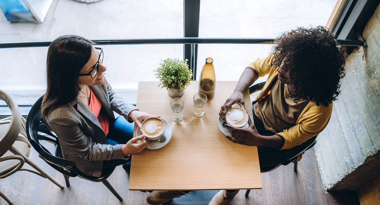 two-ladies-talking-over-coffee