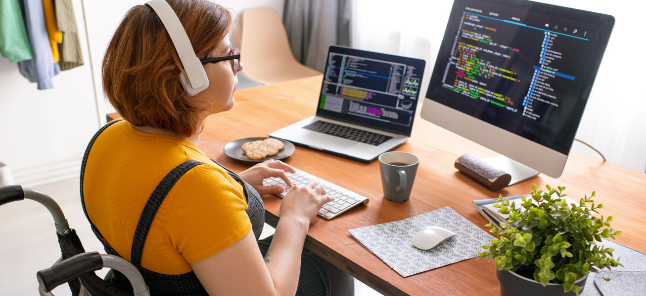 coding-woman-wheelchair-workspace-computer