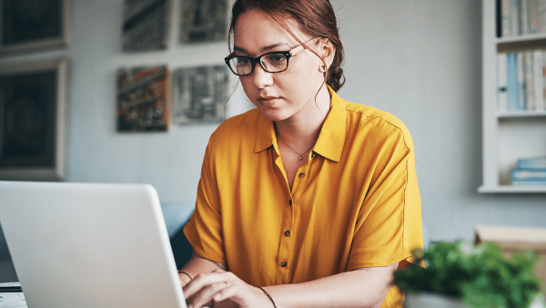 woman working on laptop from home