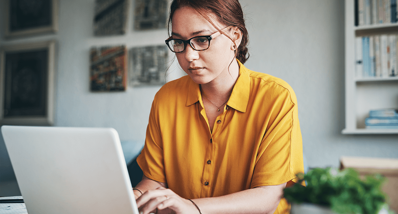 woman working on laptop from home