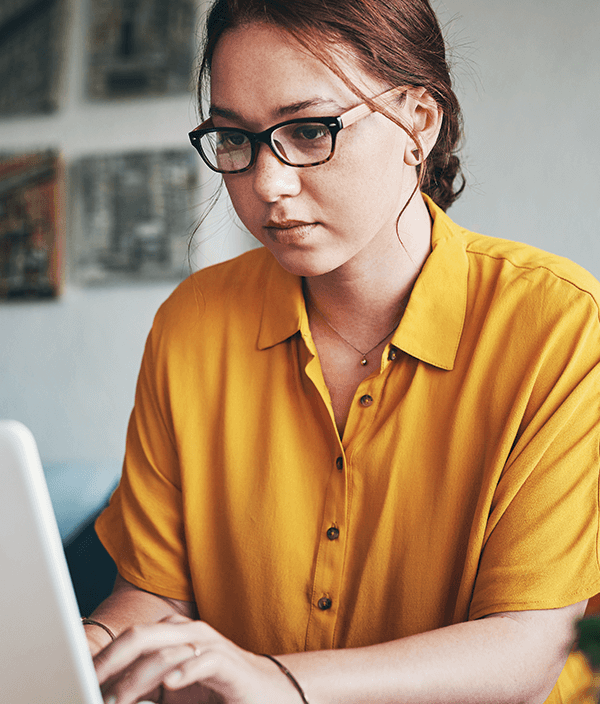 woman working on laptop from home