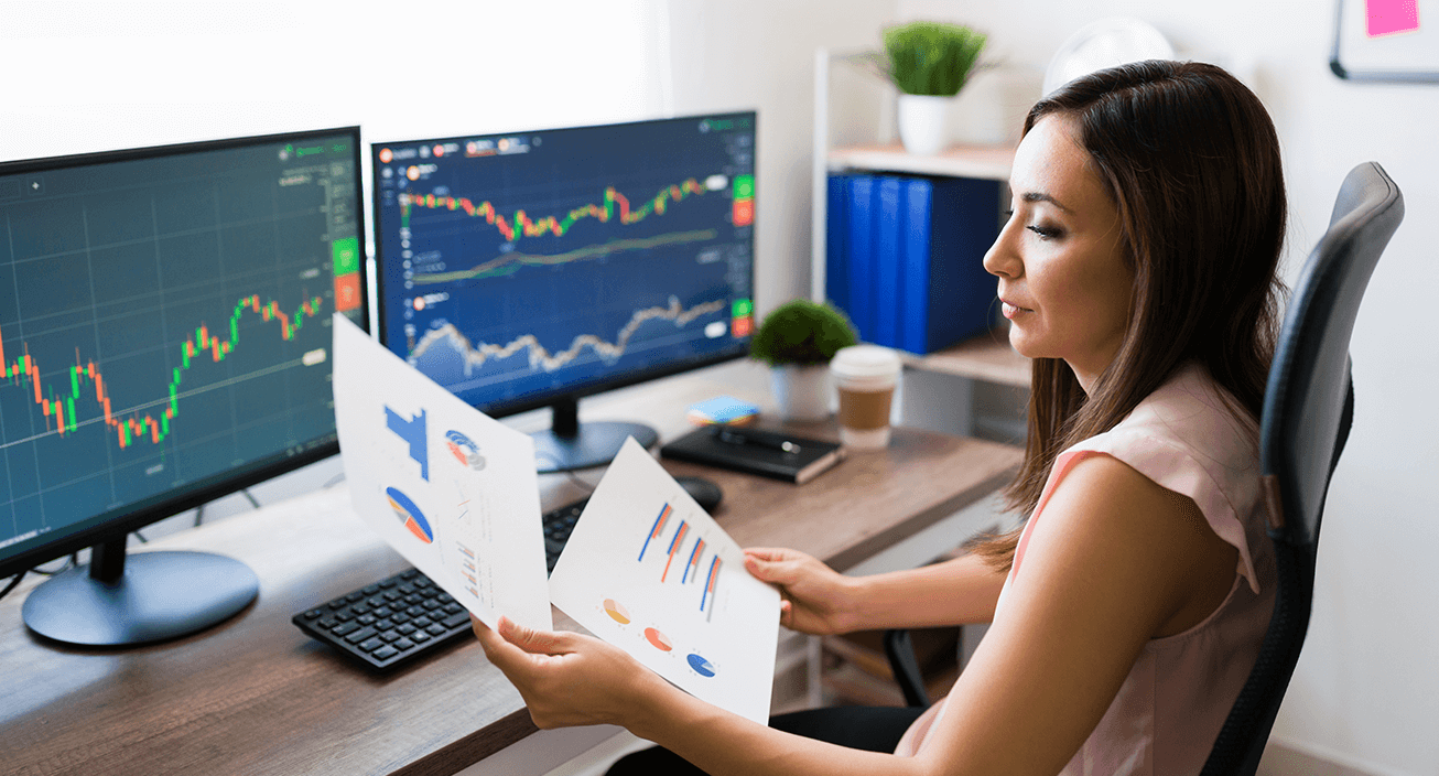 business woman analyzing stocks data at home