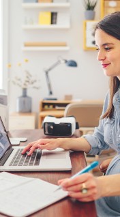 A woman researches what tax deductions she is eligible for.